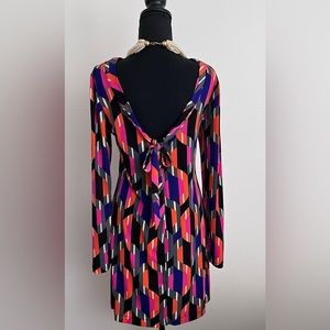 Allen B color block Dress. Light weight Polyester blend. Low back tie design.